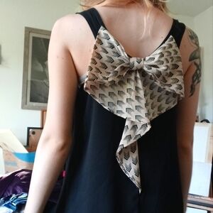 Black flowy tank top with bow